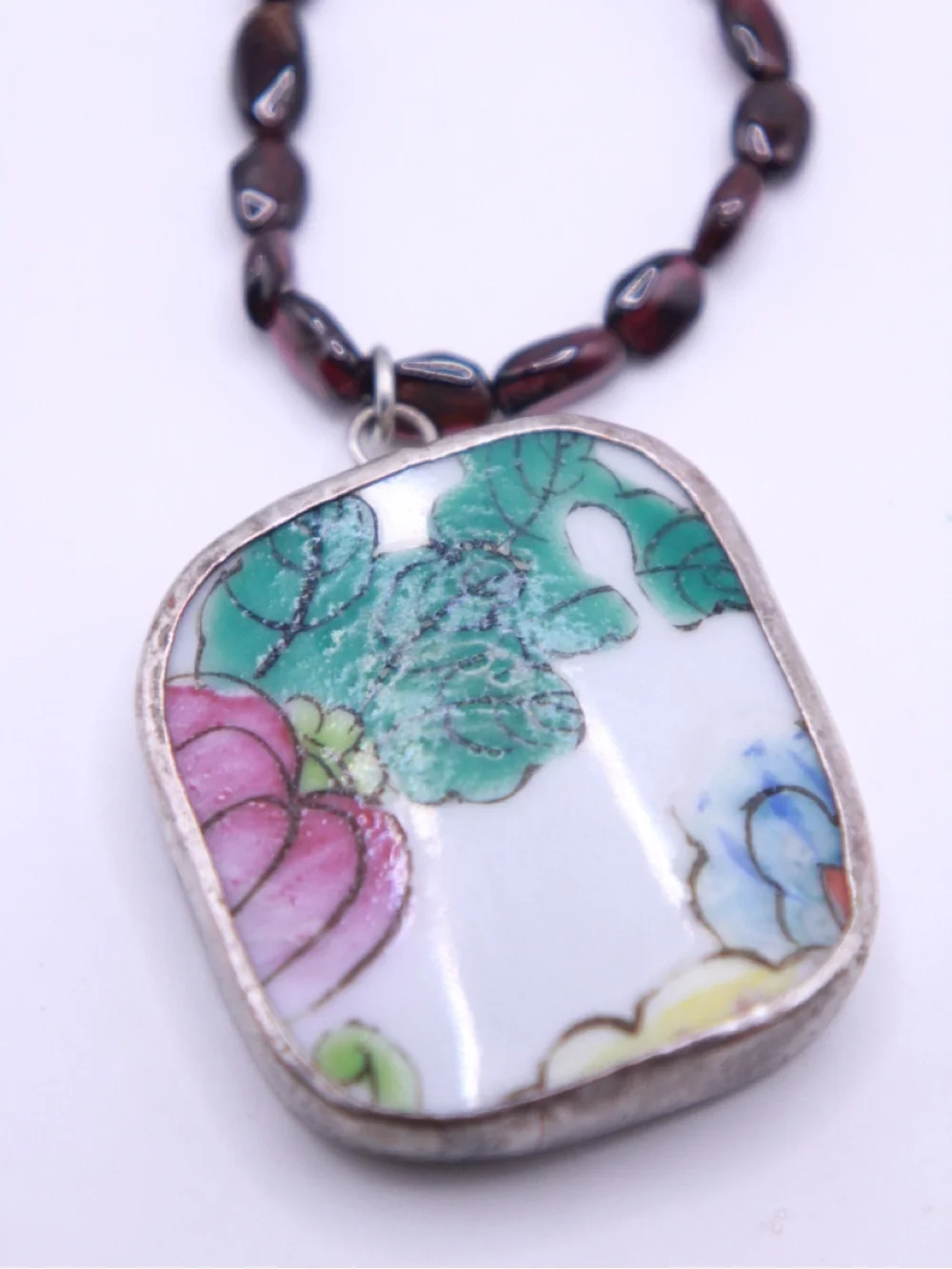 Artisan made Hand paintedPorcelain Floral Pendant on a Garnet Bead Necklace 16”
